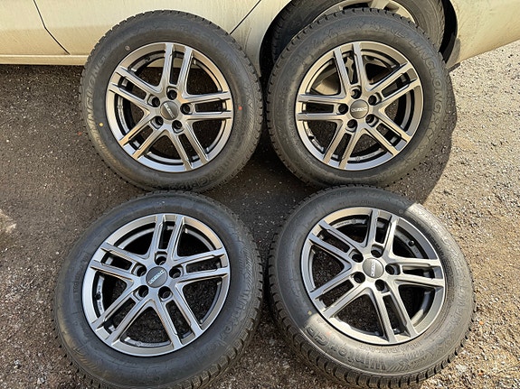 Nastarenkaat  185/65R15 alumiinivanteilla 5x100