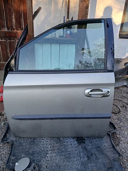 Chrysler Voyager 2003 etuovet