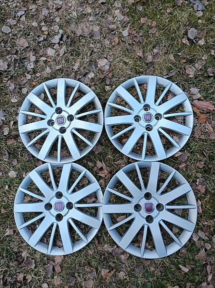Fiatin pölykapselit 15"