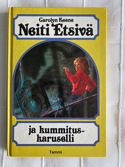 Carolyn Keene; Neiti Etsivä ja kummituskaruselli