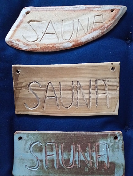 Sauna kyltti