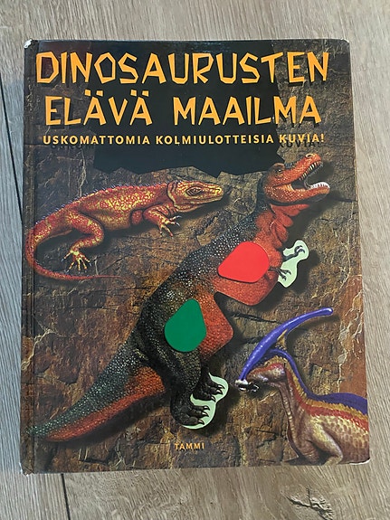 Dinosaurusten elävä maailma kirja ja dinosaurus