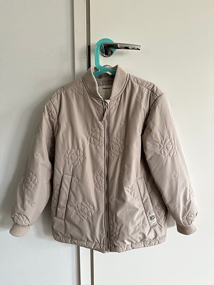 Pompdeluxin beige tikkitakki 134/140