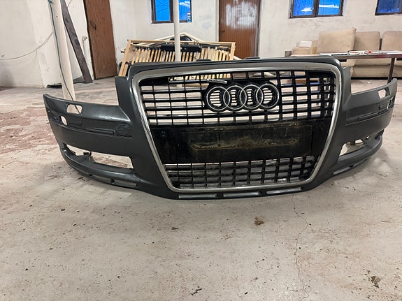 Audi a8 lasikuitu puskuri