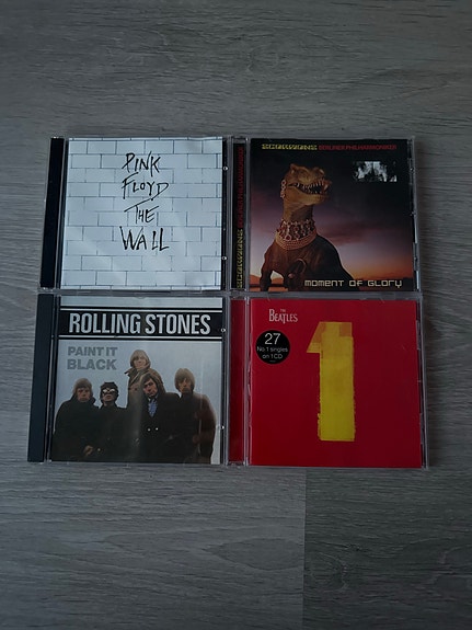 CD levyt Pink Floyd, Rolling Stones, Beatles, Scorpions