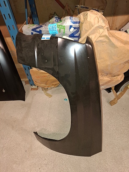 Etulokasuoja vasen Opel Corsa A 1101140