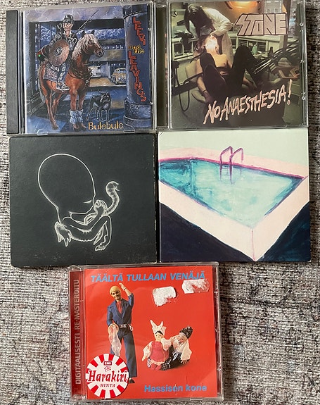 Cd levyjä. Paperi T,  Leevi, Stone, Sigur Ros, Hassisen kone