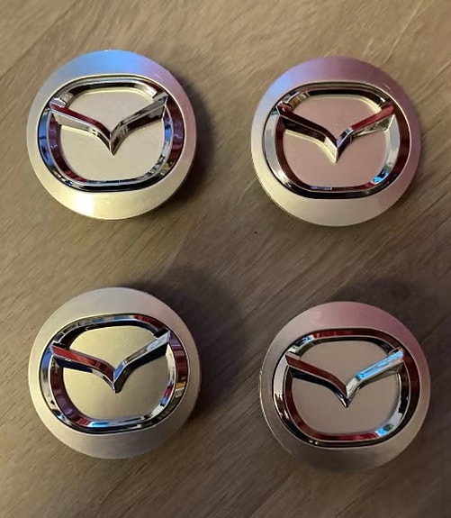 Keskimerkit Mazdan vanteisiin 56mm