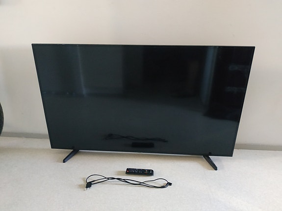 Tv SAMSUNG
55" Kaukosäädin
Jalat