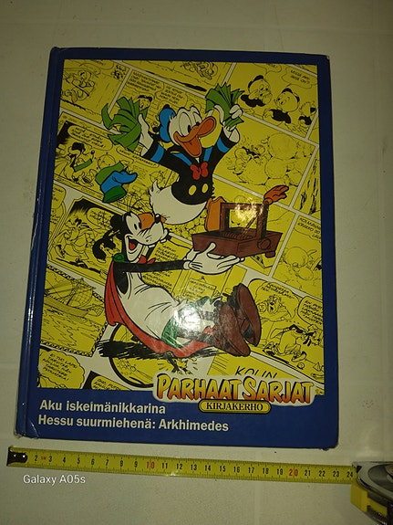 Aku Ankka Parhaat sarjat 10e - Aku iskelmäkiikarina Hessu suurmiehenä