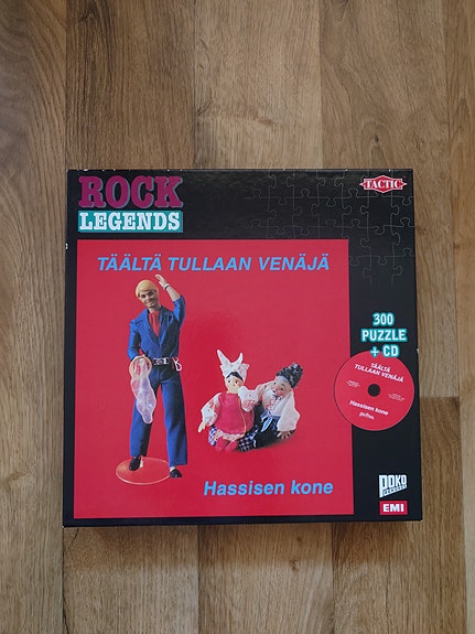 Hassisen Kone - Täältä tullaan Venäjä CD + palapeli