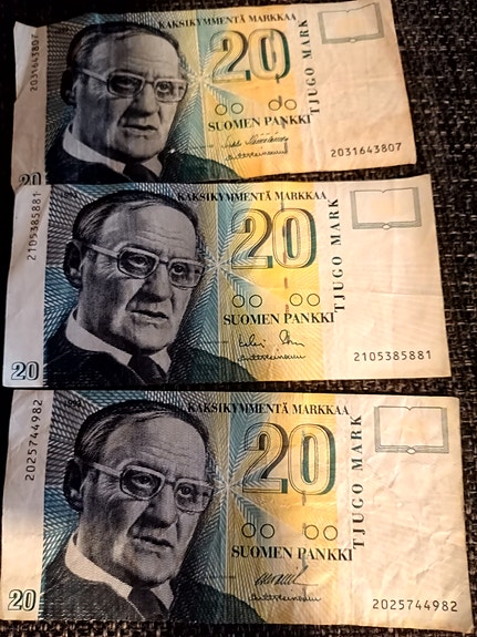 Kolme 20 markan seteliä