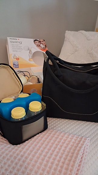 Medela Swing sähköinen rintapumppu ja kylmälaukku