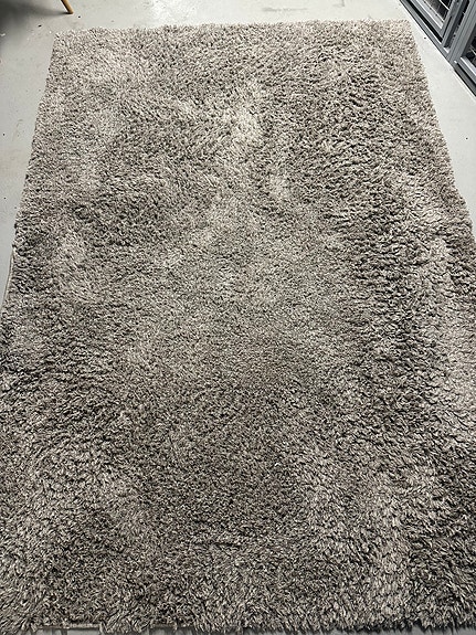 Harmaa nukkamatto