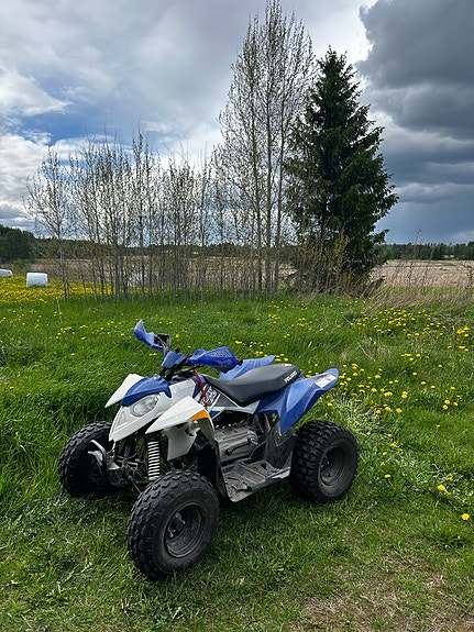 Polaris Outlaw 90cc 2013 lasten maastomönkijä