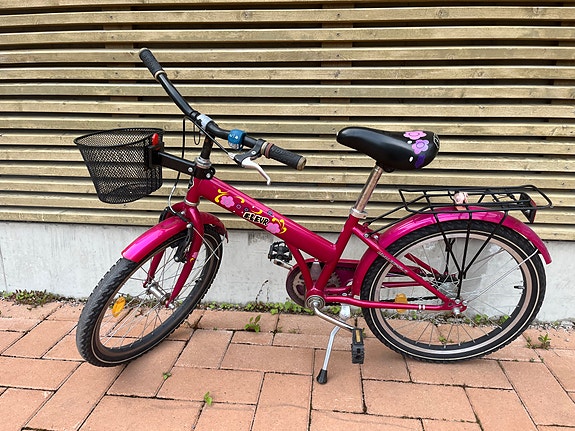 Lasten pinkki polkupyörä 20" etukorilla