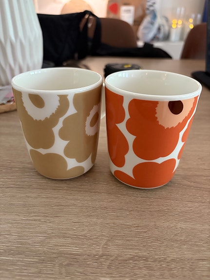 Marimekko Unikko mukit oranssi ja beige