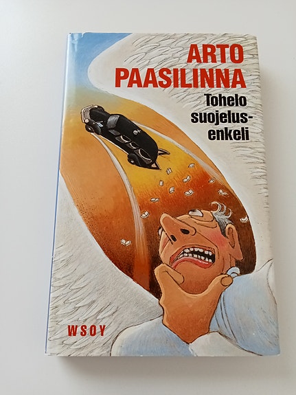 Arto Paasilinna: Tohelo suojelusenkeli kirja
