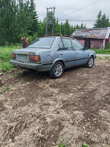 Nissan sunny B11 osia