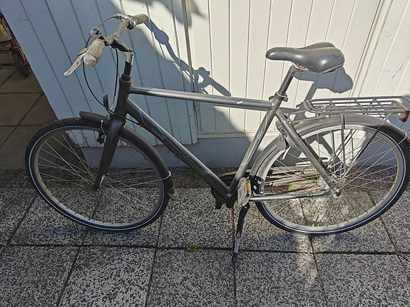 Helkama miesten kaupunkipyörä harmaa Sitsemän vaihteinen