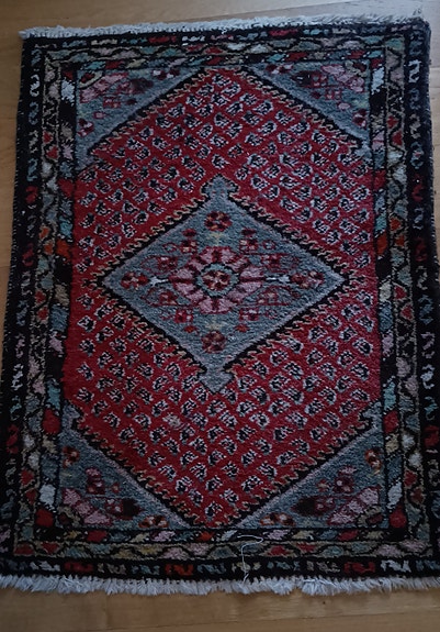 Käsinsolmittu villamatto