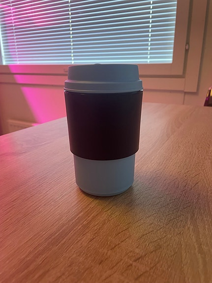 Tupperware muki kannella