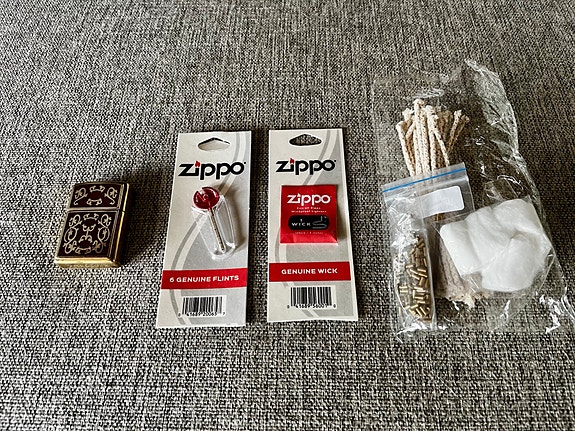 Zippo + varaosat ja tarvikkeet