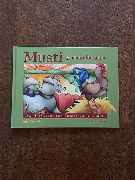 Musti ja maatilan aamu lastenkirja