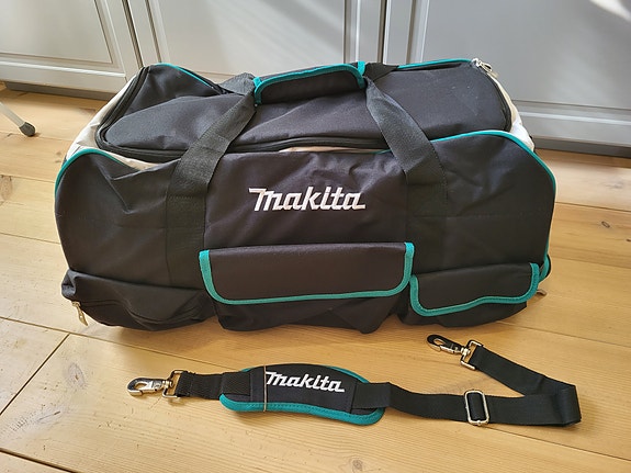Makita laukku pyörillä ja vetoaisalla