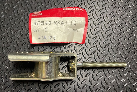 Ketjun säätölaite, Honda 40543KK4010