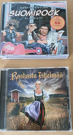 Raskasta Iskelmää CD ja SuomiRock -kokoelma 3 CD