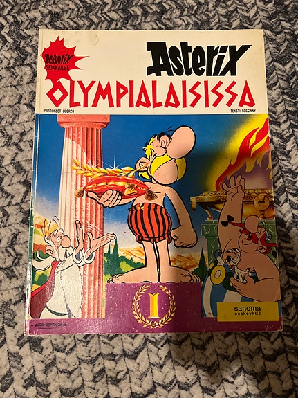 Asterix sarjakuvakirjat Olympialaisissa & Päälliköiden ottelu