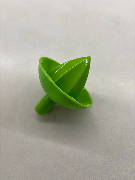 Vihreä sitruspuristin