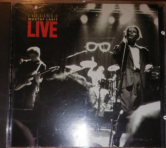 J. Karjalainen Ja Mustat Lasit – Live
