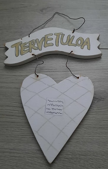 Tervetuloa kyltti