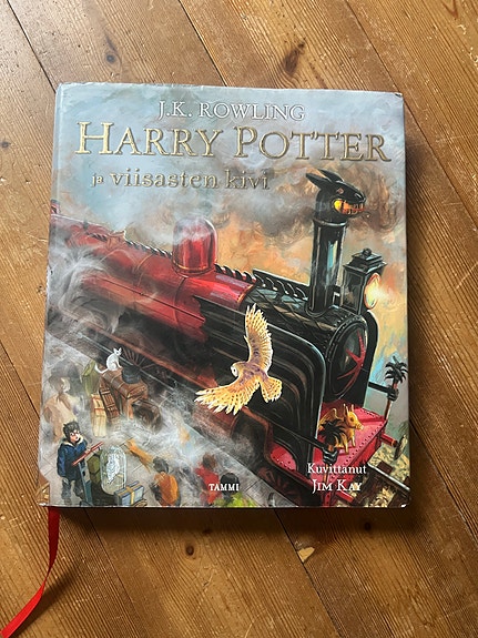 J.K. Rowling Harry Potter ja viisasten kivi kirja kovakantinen ja kuvitettu