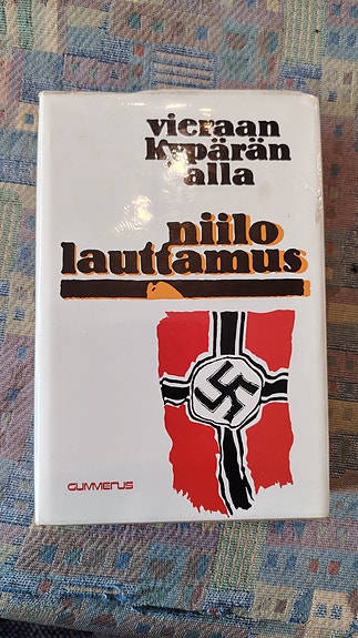 Niilo Lauttamus – Vieraan kypärän alla -kirja