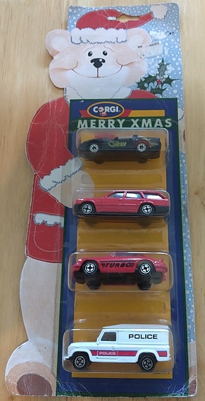 Corgi Merry Xmas 4-Pack Chevrolet Mercedes Porsche Land-Rover pakattu v. 1989