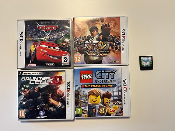 Nintendo 3DS pelejä (Cars 2, Street Fighter, Splinter Cell, LEGO City)
