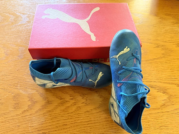 Puma Future 7 Match MG Jr jalkapallokengät koko 33 sininen