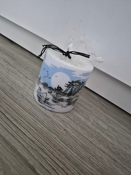 muurla  kynttilä koristekuviolla