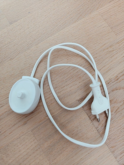 Oral-B sähköhammasharjan laturi