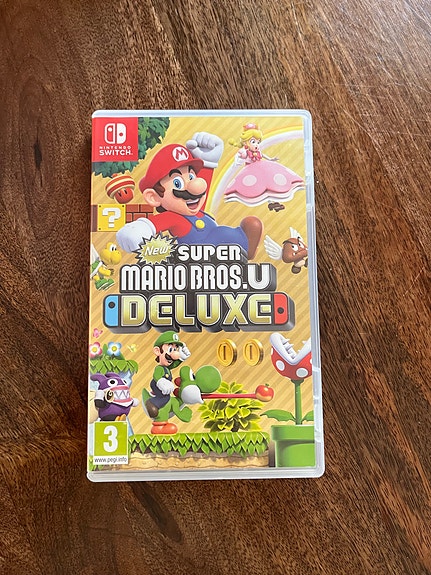 Varattu Nintendo Switch Super Mario Bros U Deluxe peli