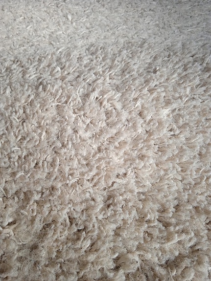 Beige nukkamatto