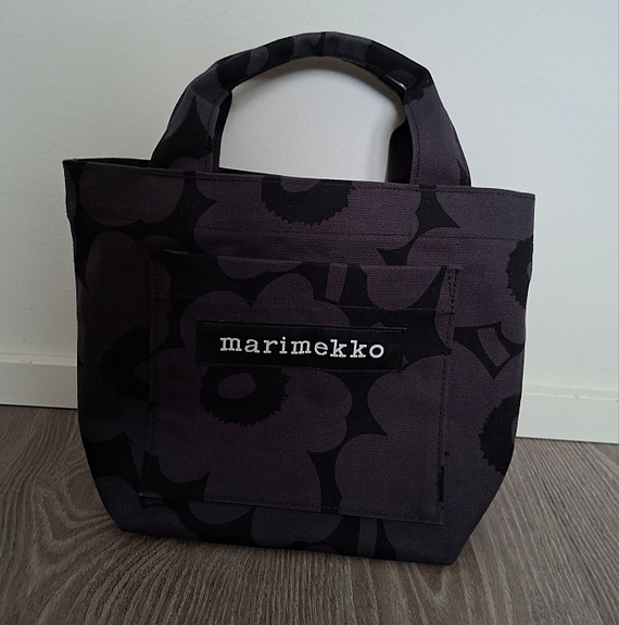 Marimekon musta-harmaa laukku