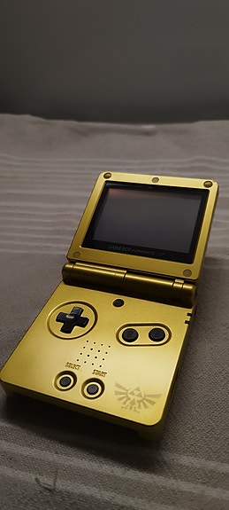 Nintendo Game Boy Advance SP Zelda Triforce Edition + alkuperäinen laturi