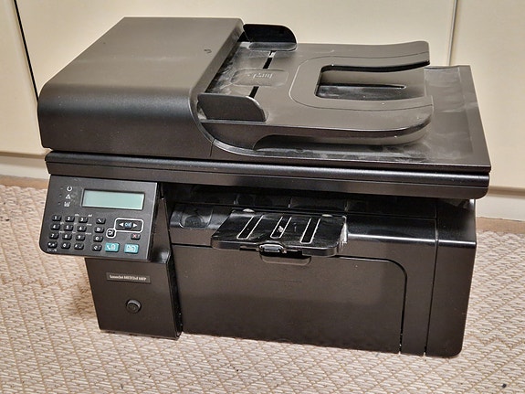 HP LaserJet M1212MF monitoimitulostin