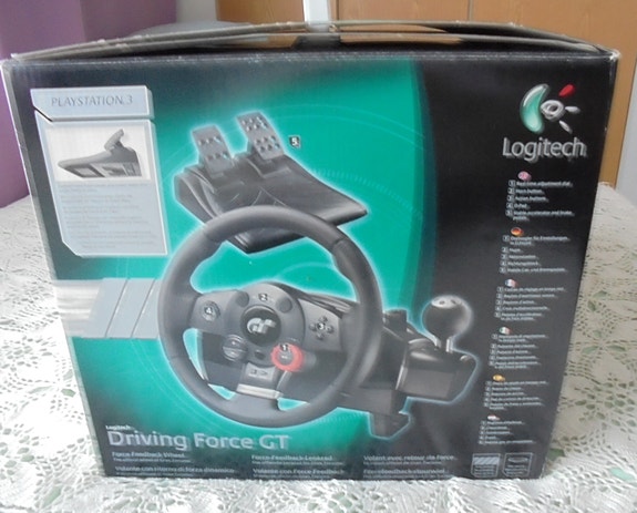 Playstation 3 logitech  Polkimet ja ratti.