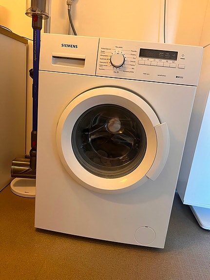 Siemens edestä täytettävä pesukone valkoinen