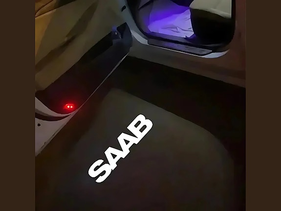 Saab logolliset ovivalot — heijasta logo maahan (2kpl)
